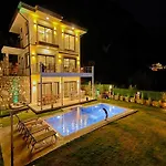With Private Pool And Sea View In Goecek,